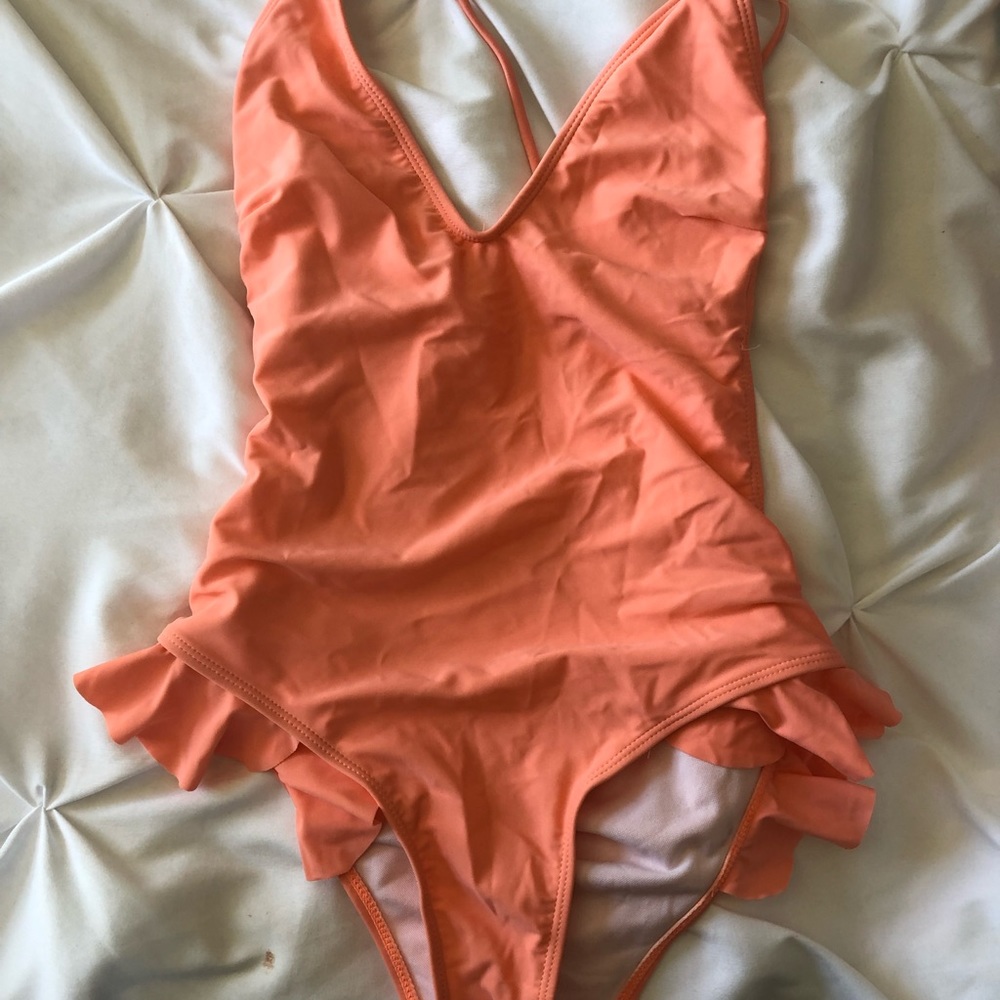 Adorable coral ruffle one piece